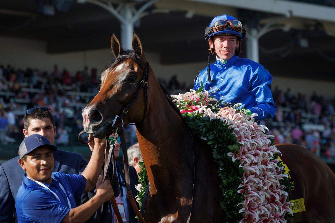 Pretty Mischievous, with Tyler Gaffalione up, celebrate their win in the 149th Kentucky Oaks at Churchill Downs on Friday.