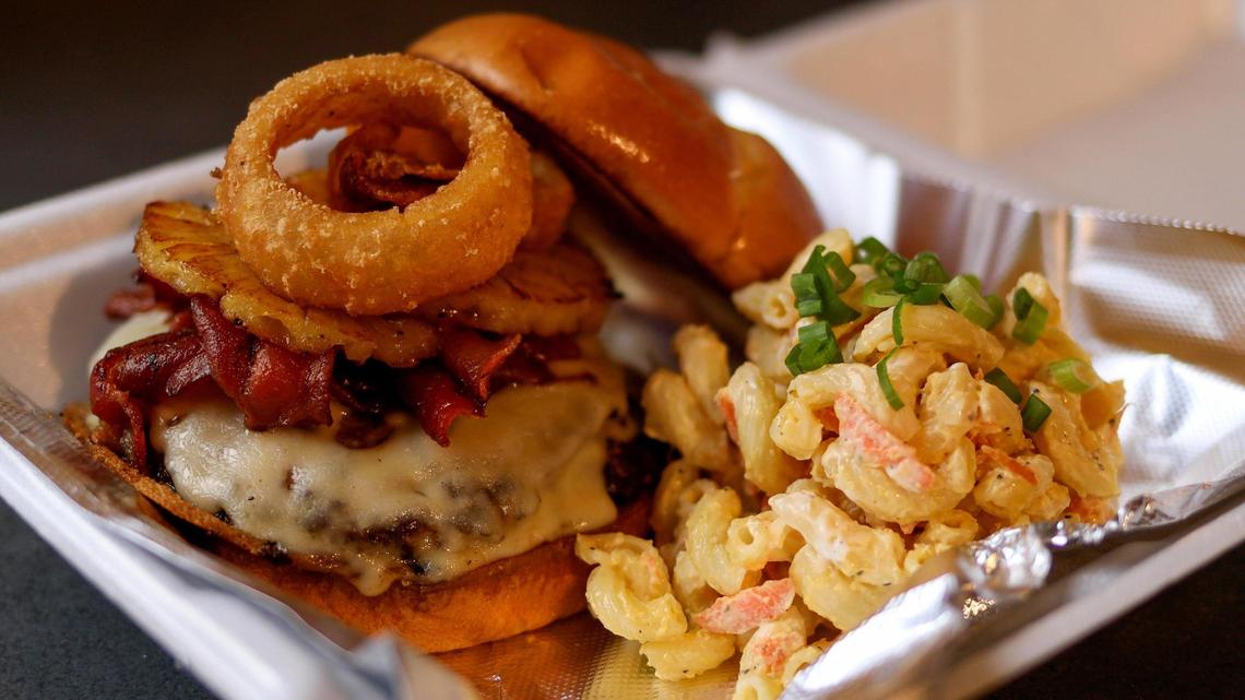 The Big Kahuna burger, right, served at The Big Kahuna Hawaiian BBQ restaurant on Liberty road.