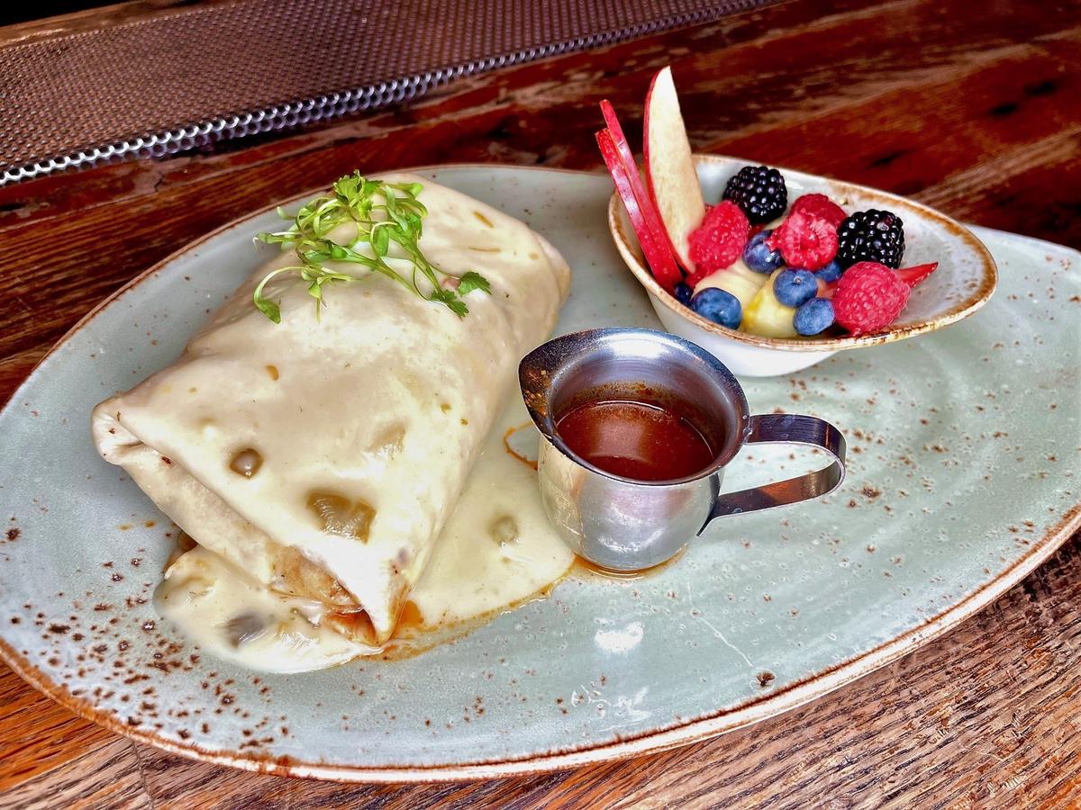 OBC Kitchen’s Birria Burrito, available during brunch hours, is a massive meal.