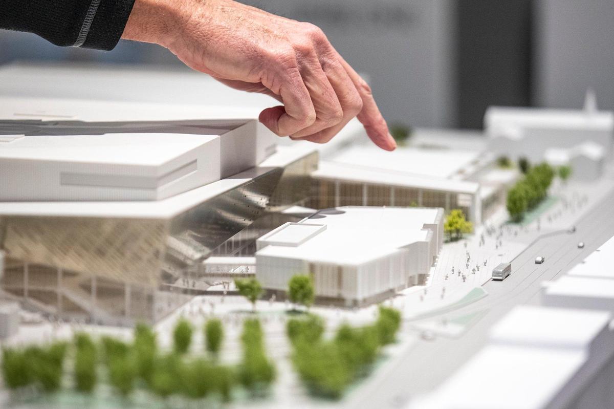 Lexington Convention Center president and CEO Bill Owen points to a model of the planned improvements to the complex in downtown Lexington, Ky. Friday, Dec. 13, 2019.