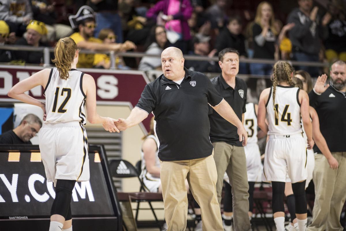 “This bunch is not about themselves,” Berea Coach Dammian Stepp, center, said. “This bunch is about Berea basketball and about what we started three years ago and an approach to being able to do something that nobody ever thought we could do.”