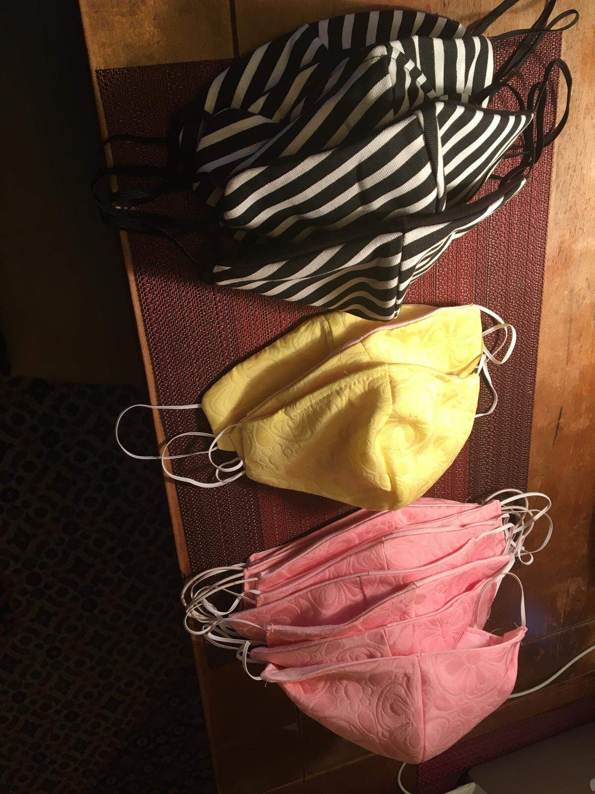 Christina A. Moore and other milliners have been sewing lovely masks for hospital workers to use.