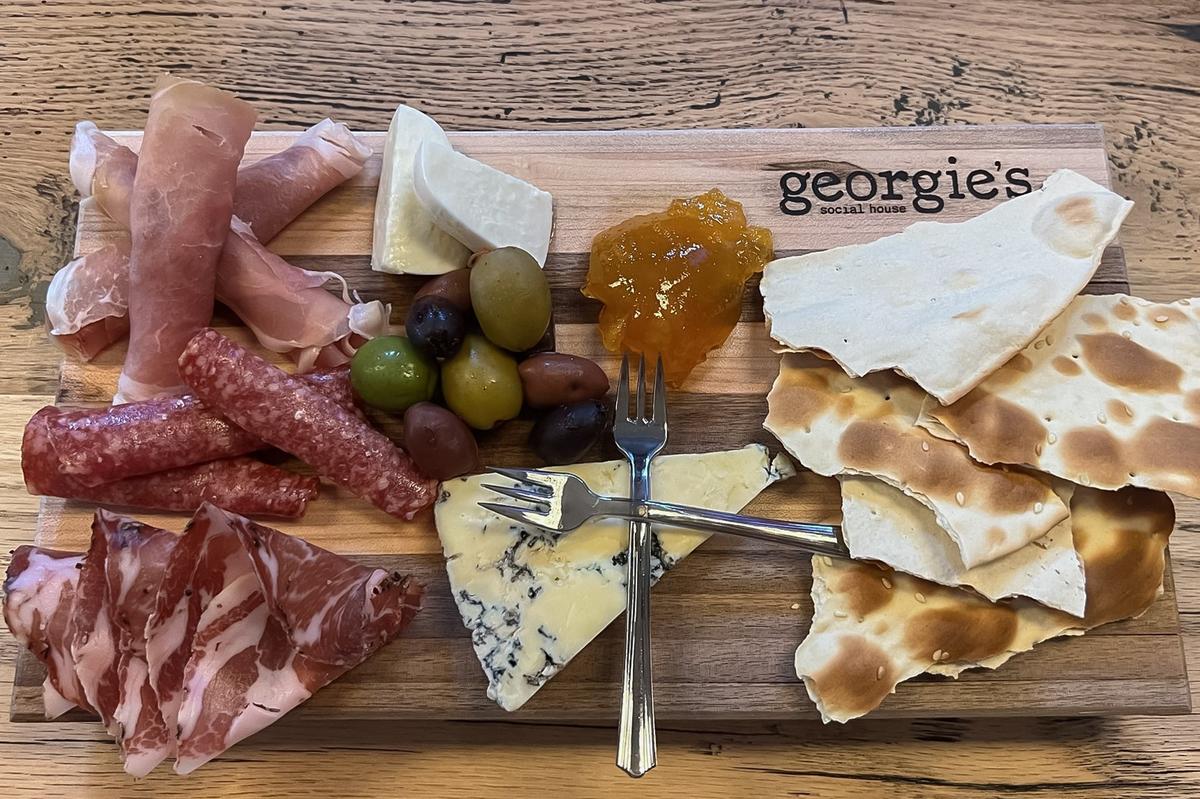 In addition to a cocktail menu, Georgie’s Social House also offers charcuterie boards at its location in downtown Lexington, Ky.