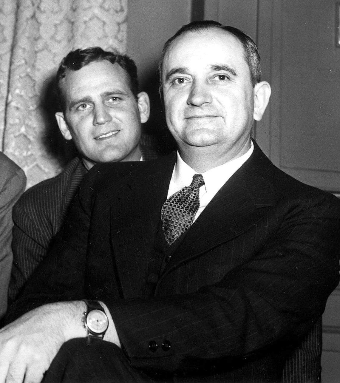 Kentucky football coach Bear Bryant, left, and basketball coach Adolph Rupp, were honored March 7, 1946, at a dinner at the Lafayette Hotel in Lexington. In his time at UK in the 1940s, Jim Howe played for both coaches.