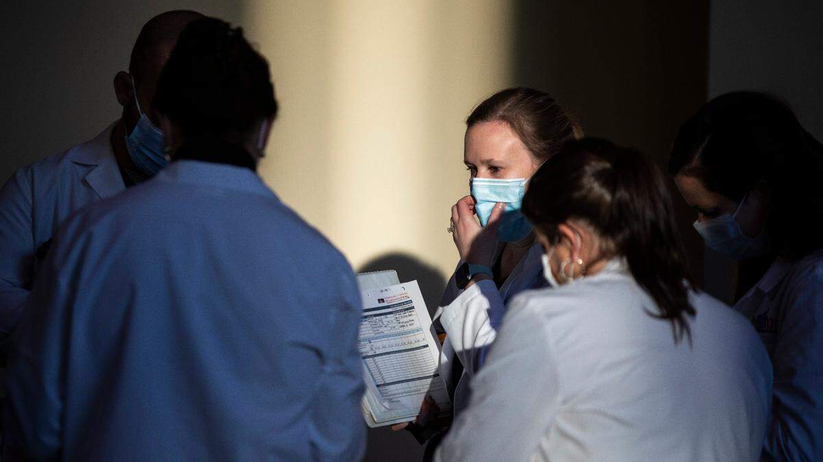Health professionals prepare for the first patients at the new high-volume regional vaccination center at the Horse Park in Lexington, Ky., Tuesday, February 2, 2021. The site is being run in partnership with Kroger and will offer 3,000 appointments in the first week. According to Secretary Jim Gray the appointments for the first three days at the vaccination center were filled in about 90 minuets.