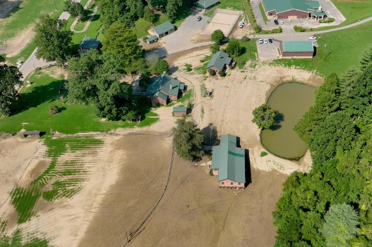 Mud covers parts of the Homeplace Community Center property in Perry County, Ky., on Tuesday, Aug. 23, 2022, following flash flooding that devastated parts of Eastern Kentucky in late July.