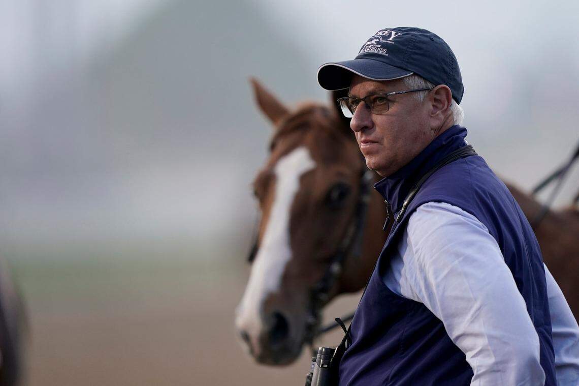 Trainer Todd Pletcher watches horses work out on the track at Churchill Downs on May 6. The trainer had two horses, Forte and Lost Ark, in Friday’s Breeders’ Cup Juvenile at Keeneland.