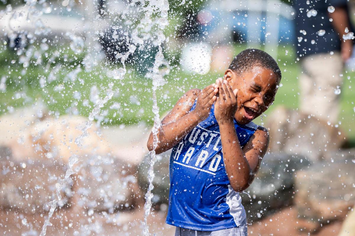 Mayor Linda Gorton announces the opening of a water feature ahead of a heat advisory for the weekend by the National Weather Service at Charles Young Park in Lexington, Ky, Thursday, July 27, 2023.