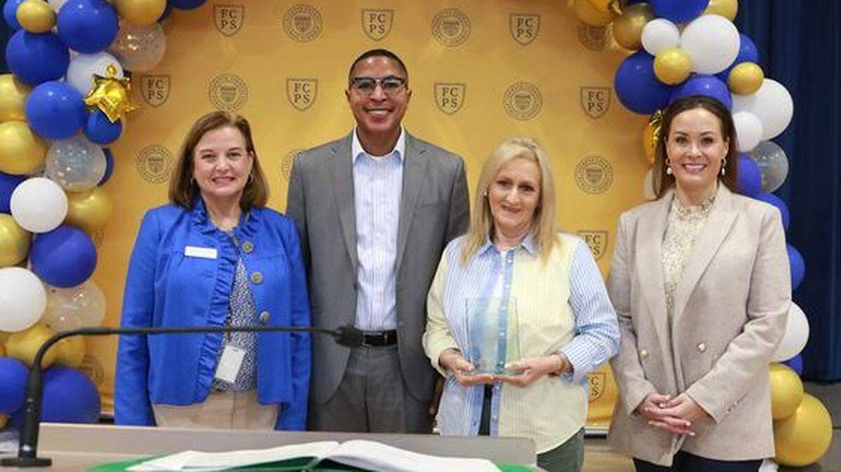From left, Interim Commissioner of Education Robin Fields Kinney, Fayette County Superintendent Demetrus Liggins, 2024 Kentucky Education Support Staff Professional winner Judy Edens and Lt. Gov. Jacqueline Coleman.