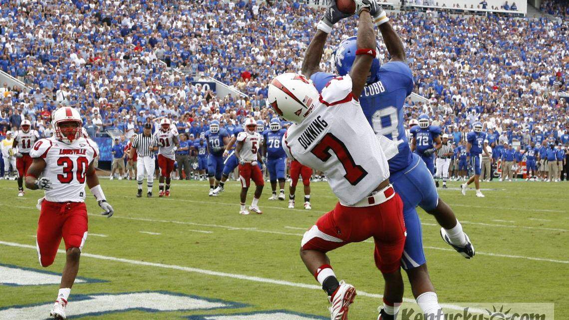 UK s Randall Cobb caught this game-winning TD in front of Louisville s Darldell Dunning (7) in the 4th quarter of the Kentucky vs. Louisville football game on Saturday, Sept. 19, 2009 at Commonwealth Stadium in Lexington. UK won 31-27.
