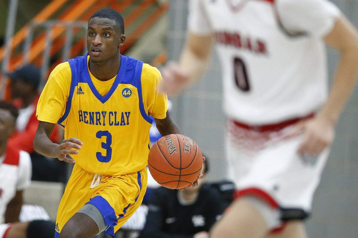 Henry Clay’s Marques Warrick (3) averages 21.9 points per game for the Blue Devils, who are ranked third in the state and open 42nd District tournament play against Bryan Station.