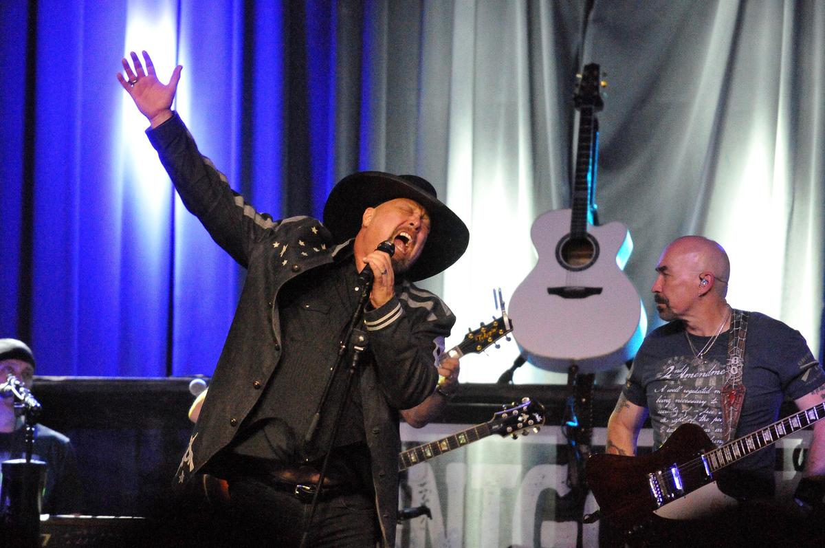 The late Troy Gentry’s signature white acoustic guitar stood at the back of the stage Friday night as Eddie Montgomery and Bo Garrett of Montgomery Gentry played Manchester Music Hall in Lexington.