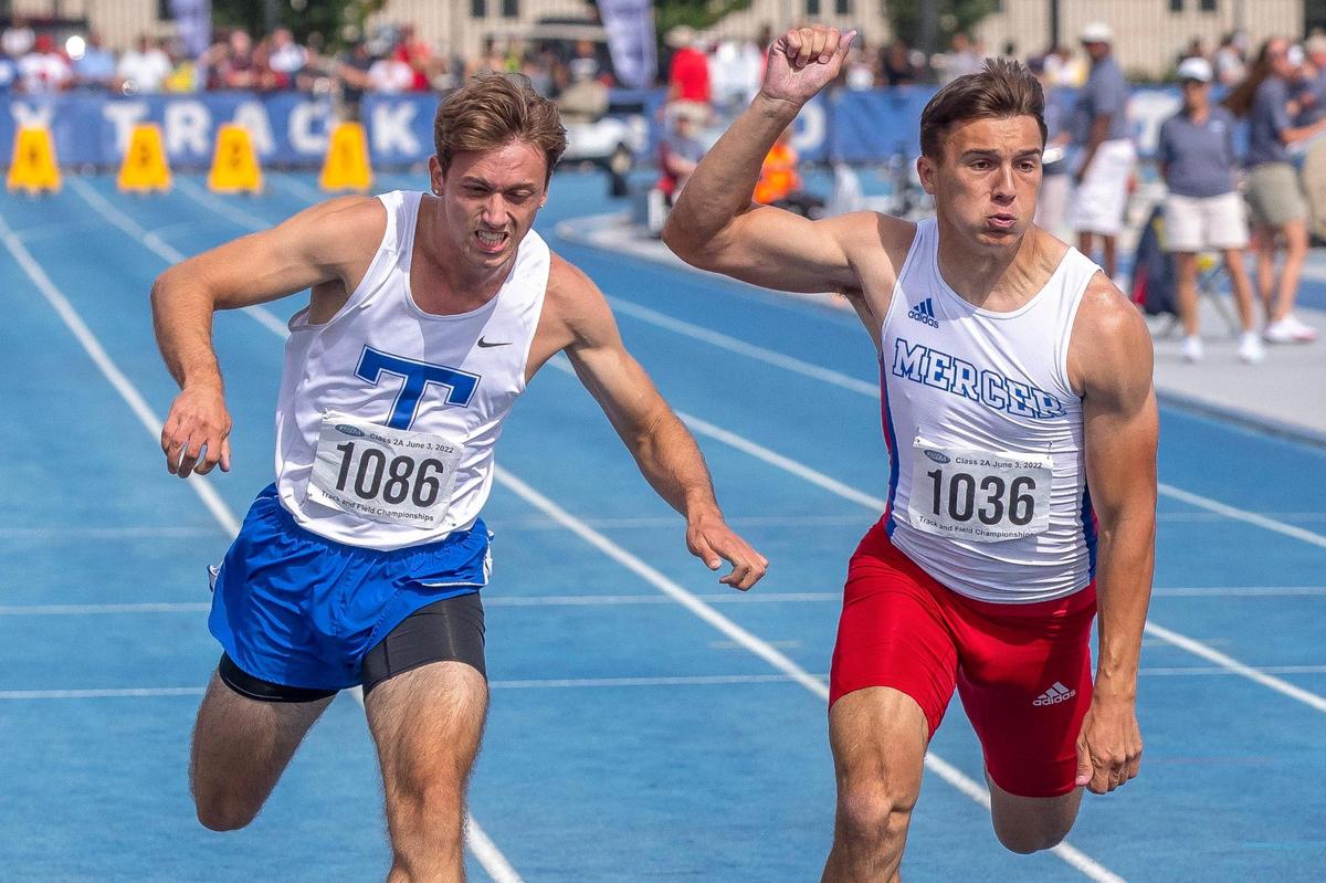 Paducah Tilghman’s Luke Birdsong, left, beat Mercer County’s Beau Brown by .006 seconds for the Class 2A boys’ 100-meter title on Friday.