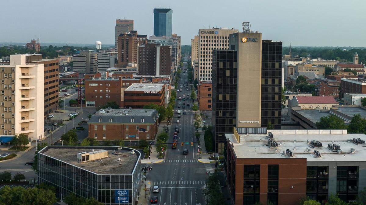 Vehicles drive along Main Street in downtown Lexington, Ky., on Thursday, June 15, 2023.