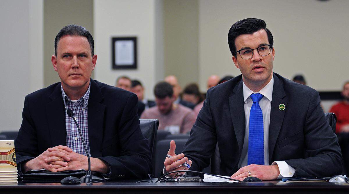 FRANKFORT, March 6 -- Ted Sandmann, (left) father of Covington Catholic High School student Nick Sandmann, sits with Sen. Wil Schroder, R-Wilder, as Schroder presents Senate Bill 240, a bill that would prohibit disseminating personally identifying information on the Internet about a minor with the intent to intimidate, abuse, threaten, harass, or frighten. Mr. Sandmann testified in favor of the bill.