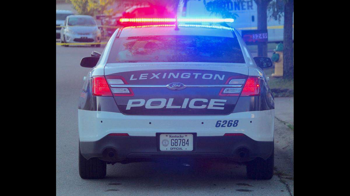 A Lexington police cruiser is parked at the scene of a homicide on the 3200 block of Creek Path Lane on Aug. 15, 2023.