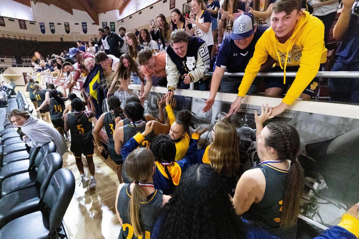Franklin County players celebrate with their student section after defeating Lafayette to win the 11th Region Tournament last Saturday.