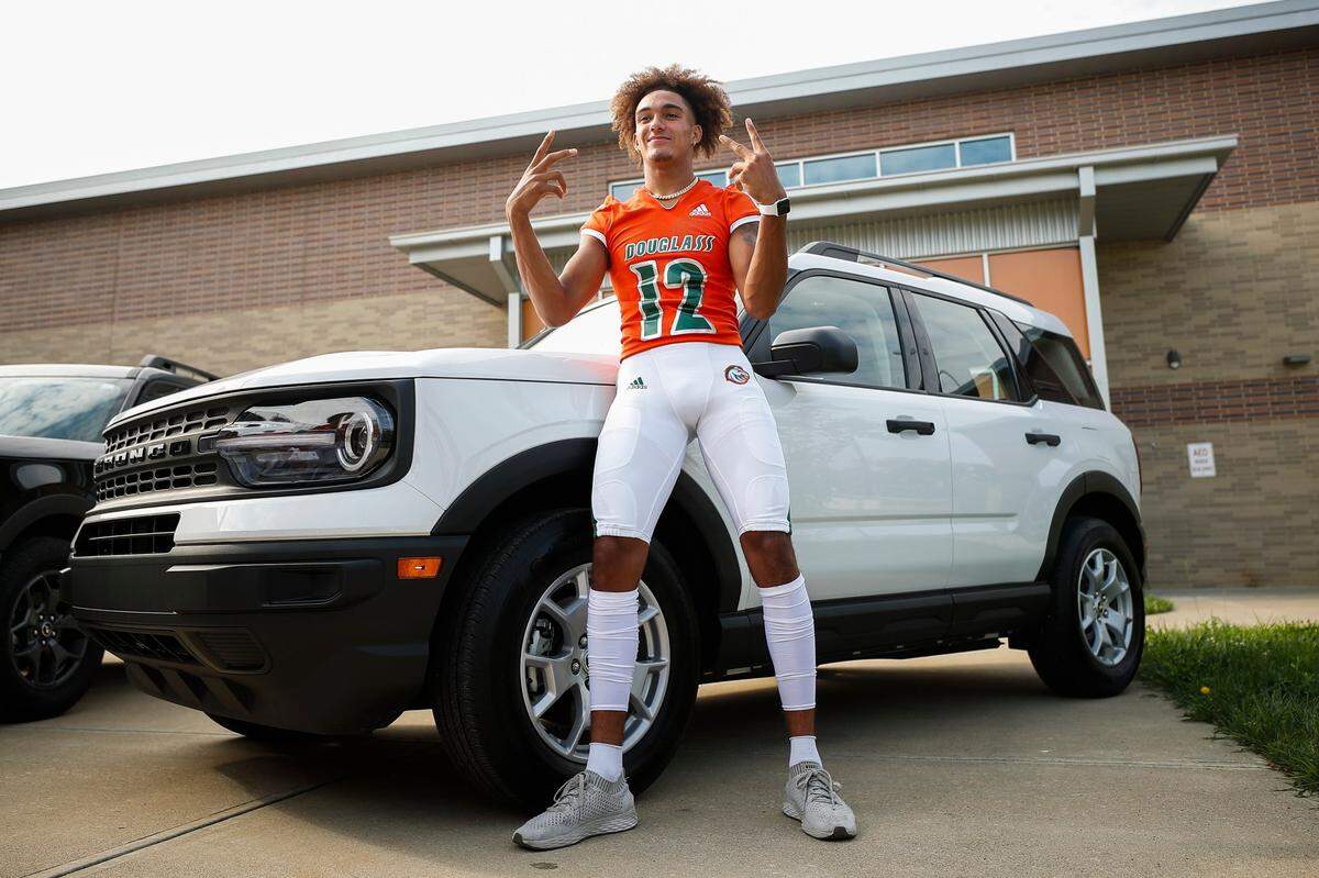 Frederick Douglass wide receiver Dane Key posed for a portrait during a team photo shoot at the high school on July 23.