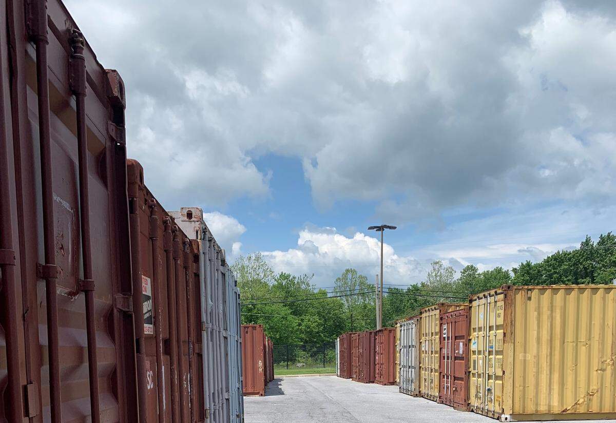 The shipping containers are excess storage for the high volume of out-of-business records ATF has been receiving, approximately 6 to 8 million per month. Once processed, paper records are destroyed. ATF currently has approximately 28,000 boxes of records in the que to be processed, many of which are stored in the shipping containers because there is no remaining storage space inside the building. Each box contains 2,000-3,000 pieces of paper, either ATF Form 4473 or acquisition and disposition records. Each 4437 represents the sale of at least one firearm, while the records represent the transfer of firearms either between FFLs or to a non-licensed individual. Each shipping container holds approximately 1,500 to 2,000 boxes, and there are currently about 40 shipping containers at ATF’s National Tracing Center.