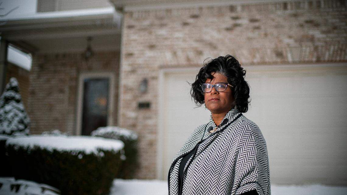 Lisa A. Brown, of Lexington, Ky., former Director of Student and Multicultural Affairs at the University of Kentucky, in front of her home.