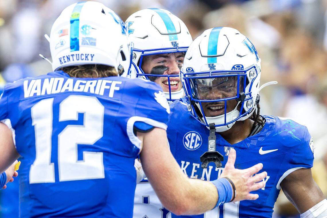 Kentucky quarterback Brock Vandagriff celebrates with running back Demie Sumo-Karngbaye, right, during a win against Ohio at Kroger Field in Lexington on Sept. 21.