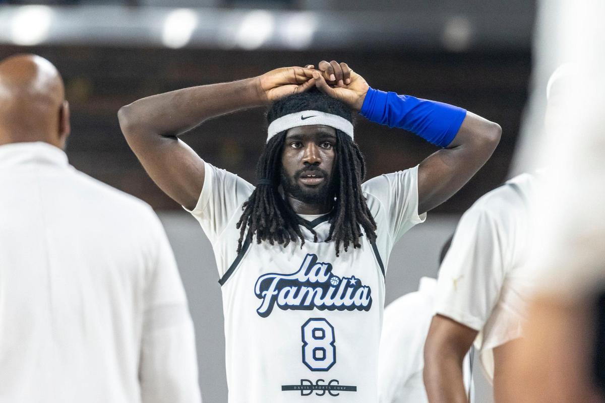 La Familia’s Kahlil Whitney (8) reacts after his team lost the Lexington Regional championship game of The Basketball Tournament against Eberlein Drive on Tuesday at Memorial Coliseum.