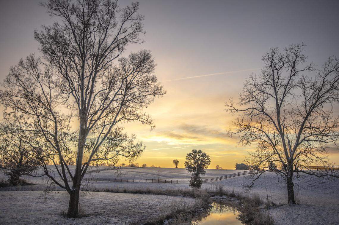 Dawn breaks over Goose Creek near Mt. Horeb Pike in Scott County, Ky., Wednesday, Nov. 13, 2019.
