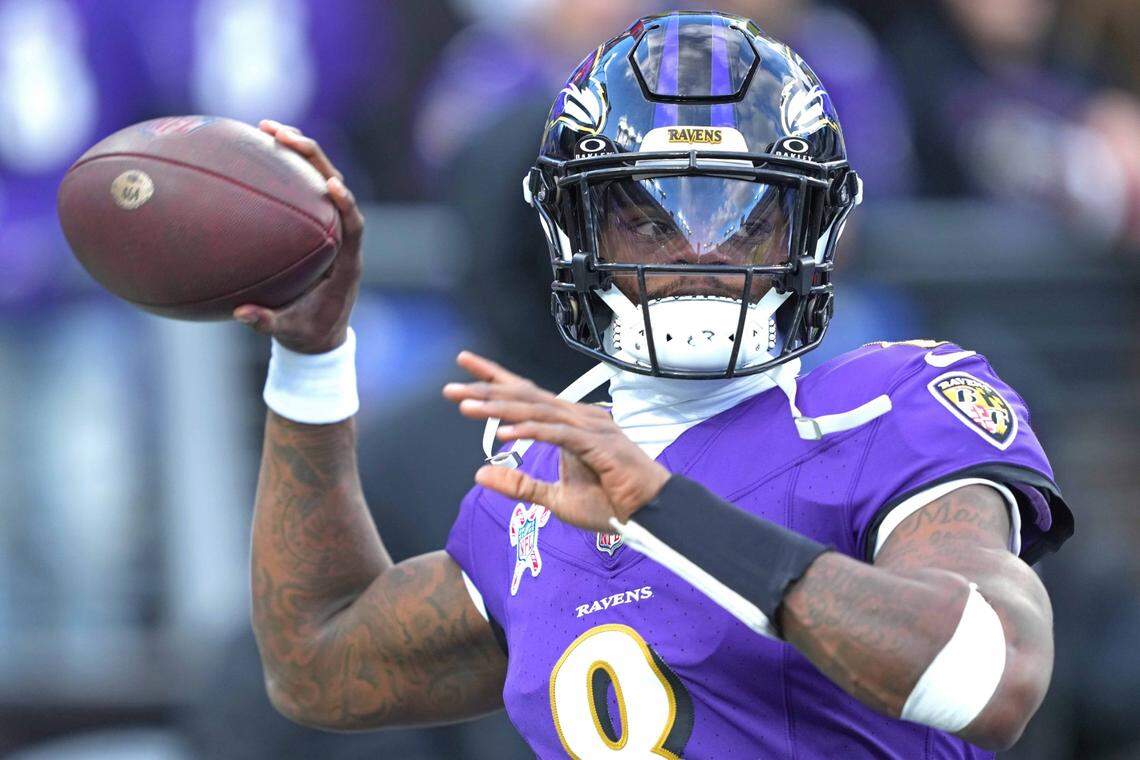 Dec 21, 2024; Baltimore, Maryland, USA; Baltimore Ravens quarterback Lamar Jackson (8) warms up prior to the game against the Pittsburgh Steelers at M&T Bank Stadium. Mandatory Credit: Mitch Stringer-Imagn Images