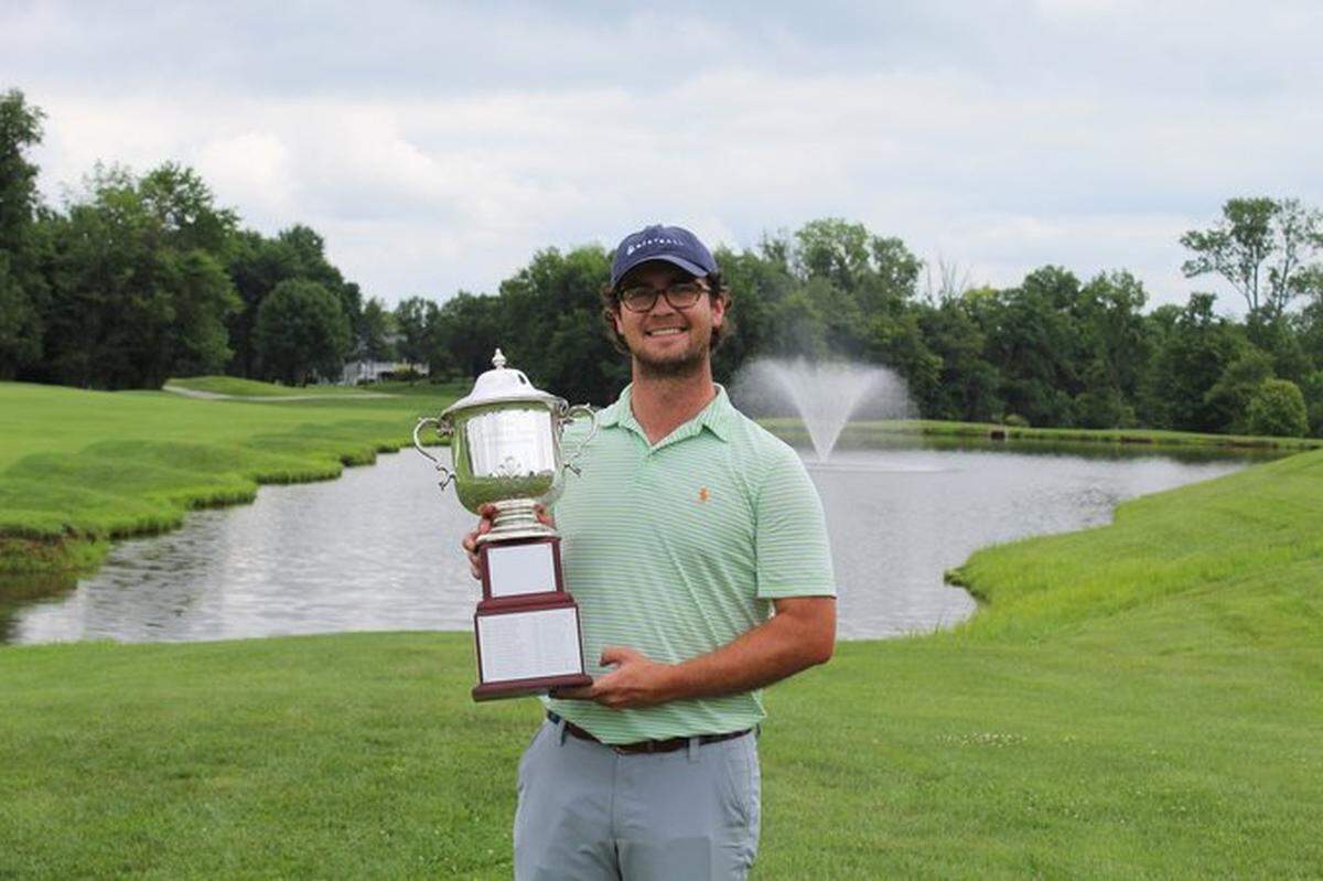 Danville’s J.B. Williams posed with the trophy after winning the Kentucky Open for the second straight year.