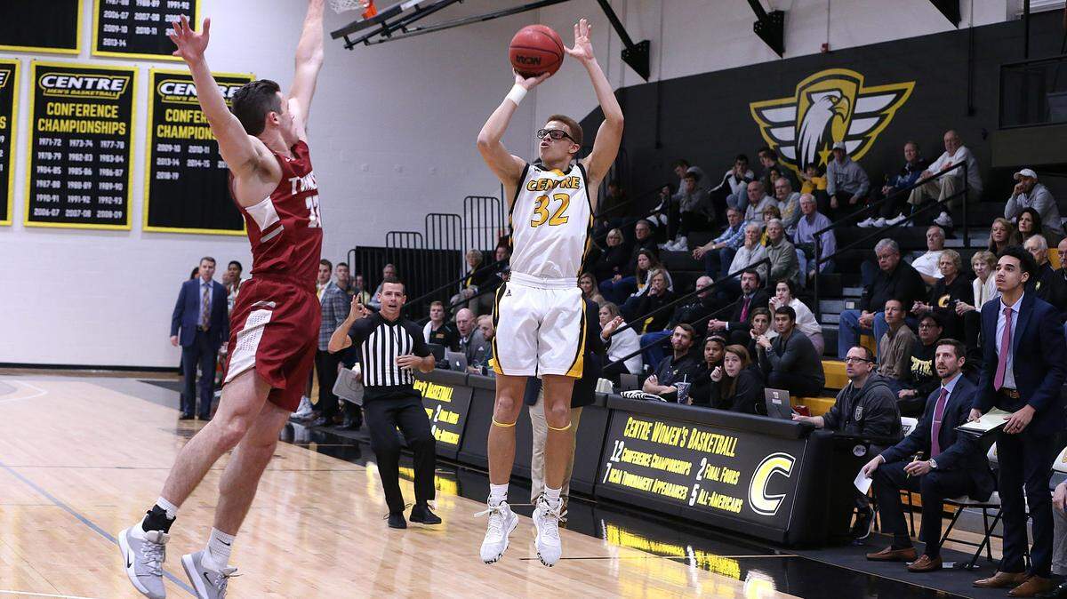 Centre’s Perry Ayers put up a shot over Transylvania’s Zach Larimore when the teams met in Danville this season. The only way they’ll play each other again this season is if both reach the NCAA Division III championship game.