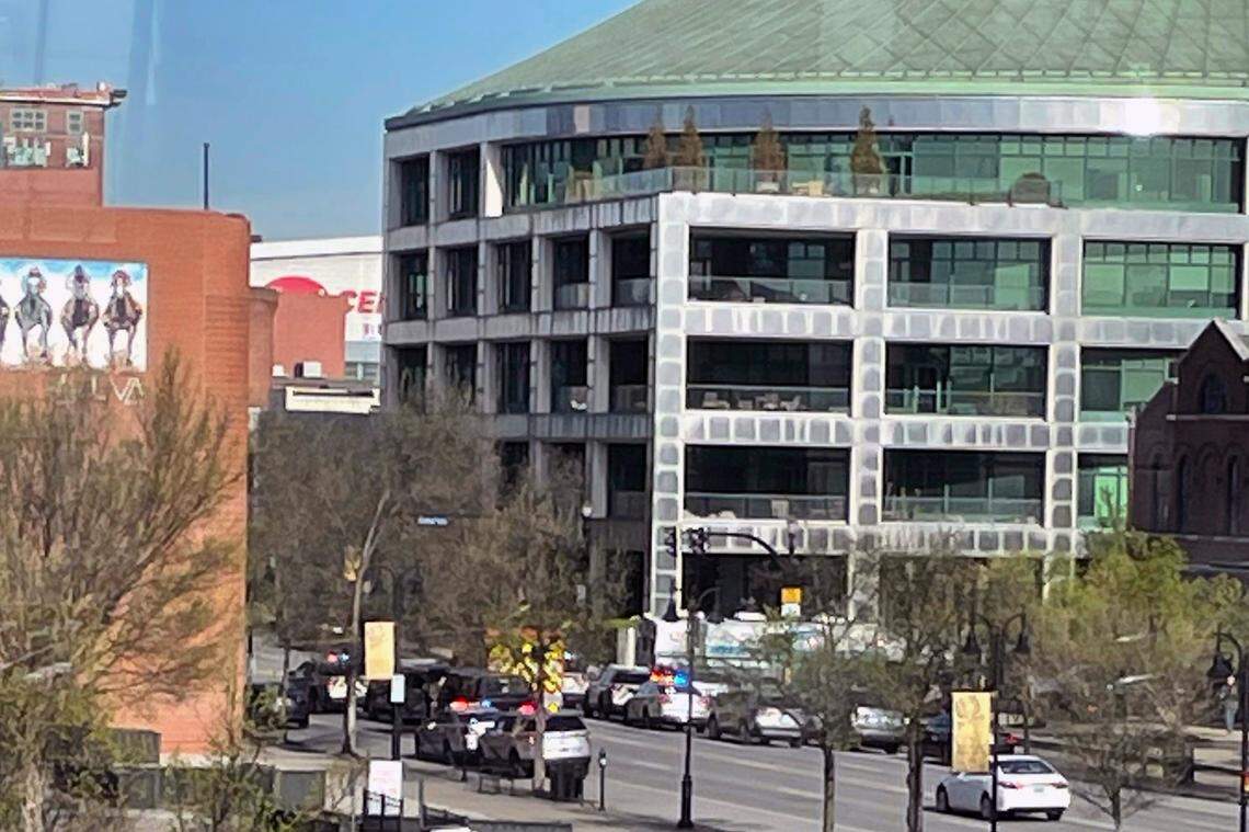 This photo provided by Reid Cornell shows police presence near the scene of a shooting in Louisville, Ky., Monday, April 10, 2023. (Reid Cornell via AP)