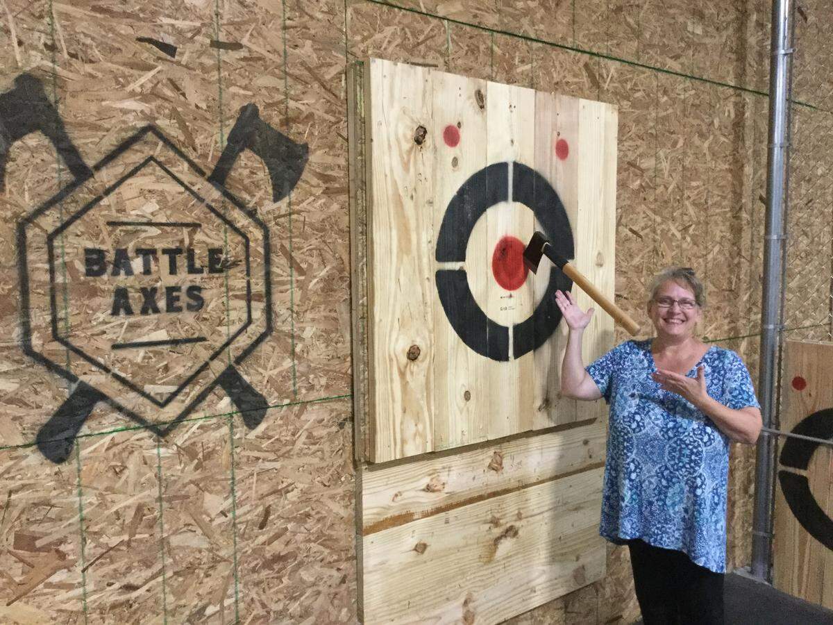 After I finally got a hatchet to stick, I was so excited I took a photo with my bull’s eye. Throwing an axe at a target is surprisingly satisfying, once you finally get the hang of it.