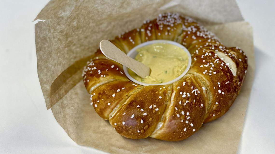 A 7 oz. Papa Pretzel ($6) with Papa’s Cheddar beer cheese ($2) from The Wandering Bock Pretzel Pub & Brat Haus, a local pub / bakery that sells its handmade pretzels at its Greyline Station location, farmers markets and wholesale to some local restaurants. The homemade beer cheese is made with cheddar, jalapeño, onion, garlic and lager. 