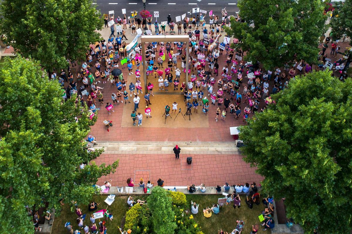 People gather near Robert F. Stephens Courthouse Plaza in downtown Lexington, Ky., on Friday, June 24, 2022 to protest the U.S. Supreme Court’s overturning of Roe v. Wade.