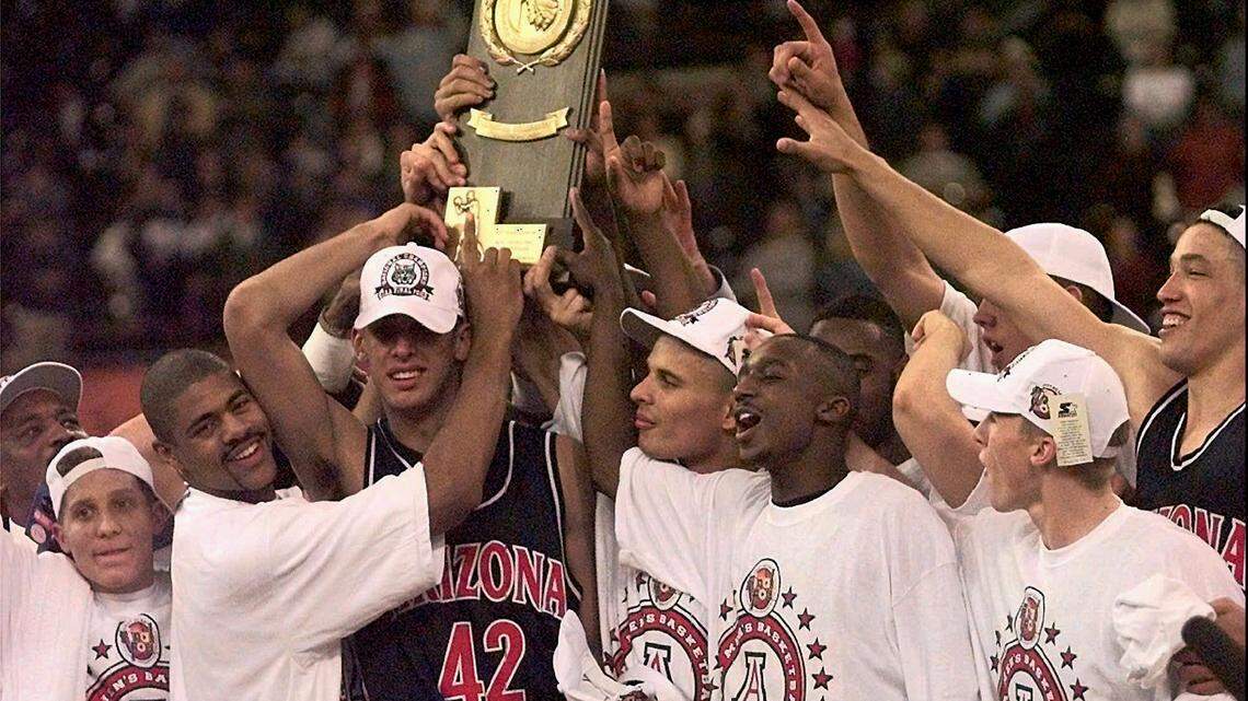 Arizona celebrated after beating Kentucky 84-79 in overtime for the 1997 national title. UK played without the injured Derek Anderson; with him, the outcome might have been different.