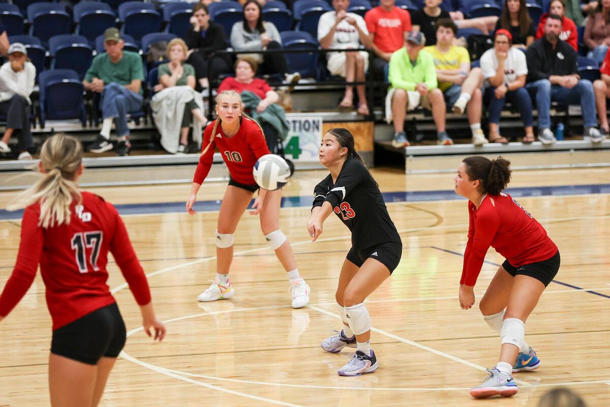 Paul Laurence Dunbar’s Mia Telechbush (23) received a serve during the Bulldogs’ match at Great Crossing High School on Sept. 27. The Bulldogs are the state’s No. 3 ranked team.
