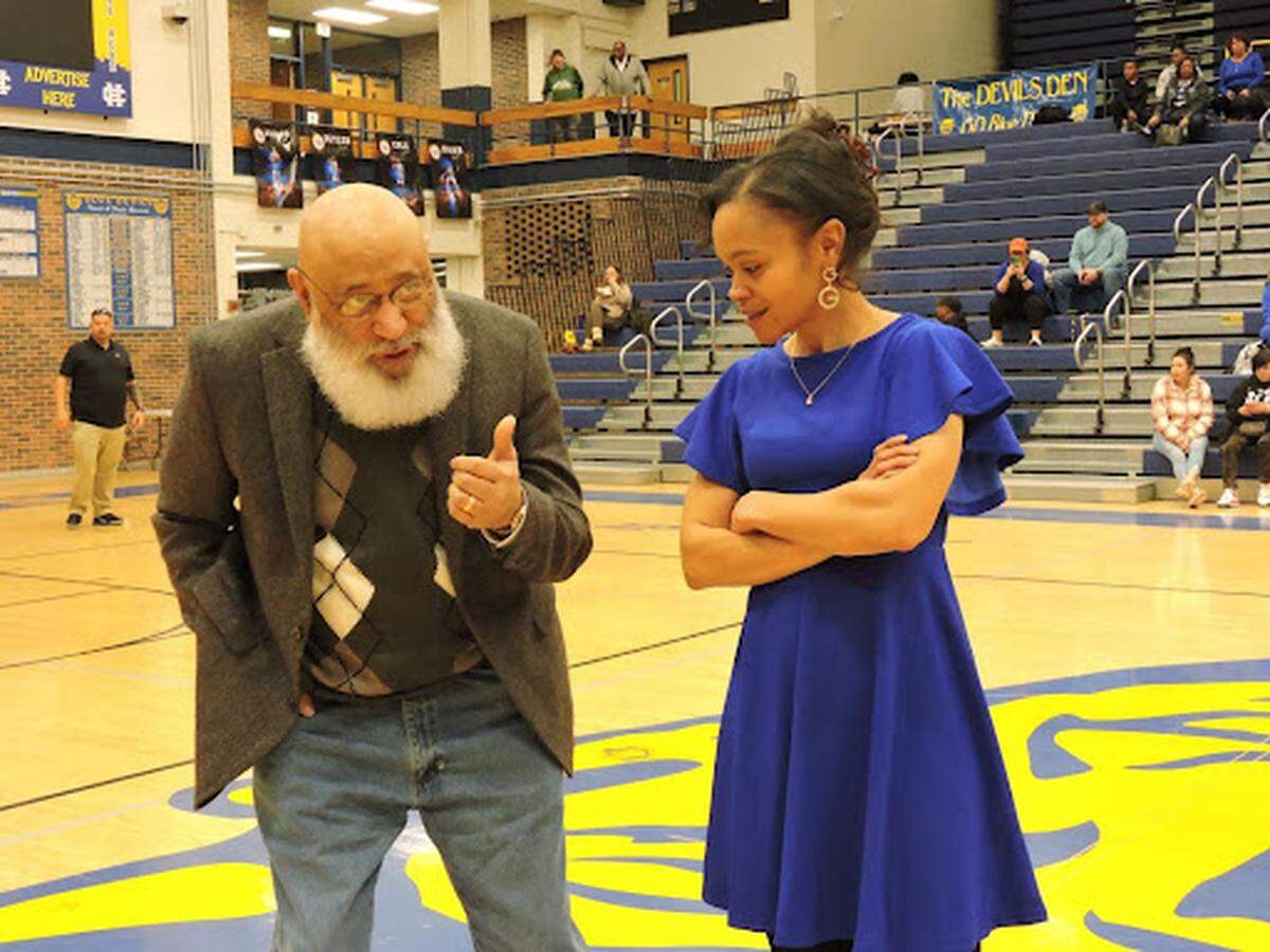 Maurice Garrard, left has run a prominent AAU program in Central Kentucky for more than 30 years. His daughter Ashley Garrard, right, played and coached under him.