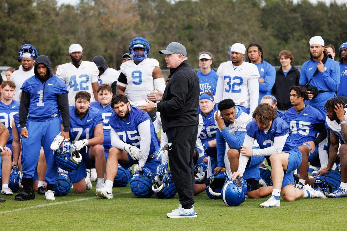Kentucky head coach Mark Stoops addresses his team during practice in Jacksonville, Florida, on Wednesday in preparation for Friday’s Gator Bowl against Clemson. The Tigers, ranked No. 22 in the most recent College Football Playoff ratings, are favored by about five points, depending on the wagering outlet.