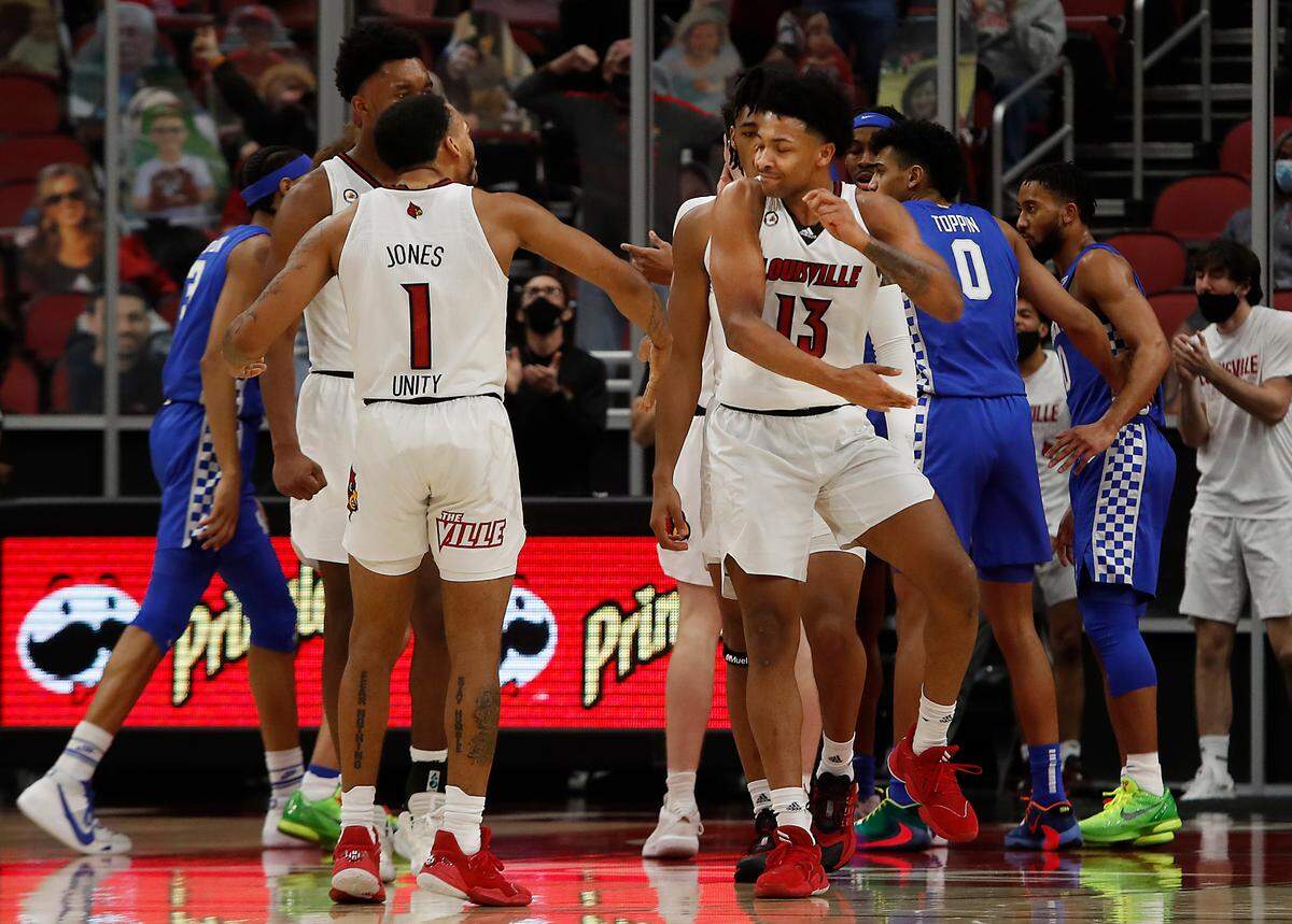 Louisville guards Carlik Jones, left, and David Johnson are seeking to lead the Cardinals into the NCAA Tournament.