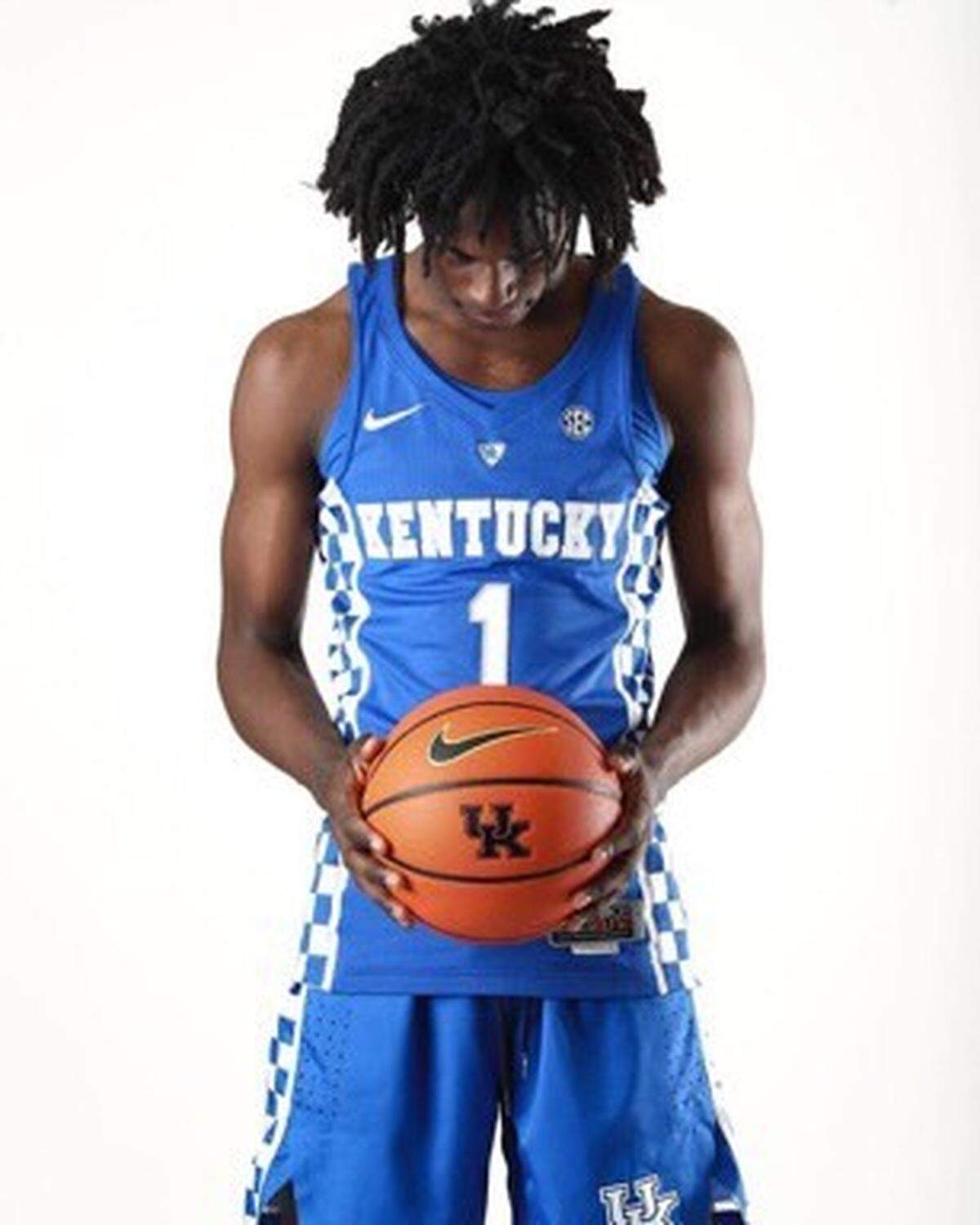Class of 2024 Kentucky basketball recruit Ian Jackson posed for photos in a UK uniform during his visit to Big Blue Madness in October.