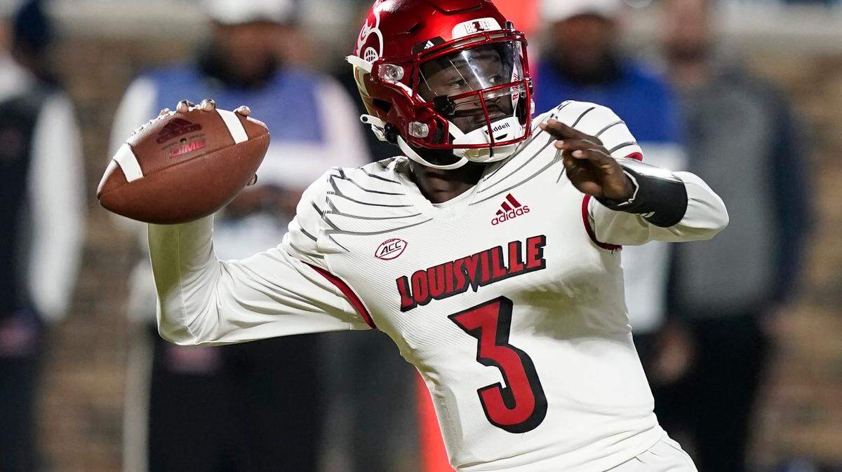 Louisville quarterback Malik Cunningham (3) looks to pass against Duke during the first half of an NCAA college football game in Durham, N.C., Thursday, Nov. 18, 2021. (AP Photo/Gerry Broome)