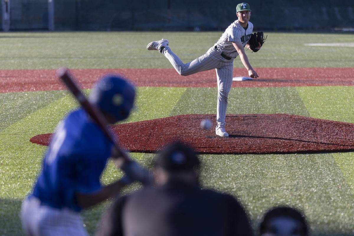 Trinity's Grayson Willoughby pitches during a game at Lexington Catholic High School in Lexington, Ky., on Tuesday, May 12, 2026.