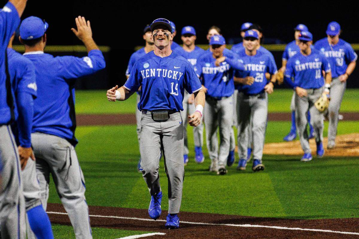 Jun 2, 2024; Lexington, KY, USA; Kentucky Wildcats outfielder Nolan McCarthy (19) celebrates with teammates after Kentucky wins against the Indiana State Sycamores at Kentucky Proud Park. Mandatory Credit: Jordan Prather-USA TODAY Sports