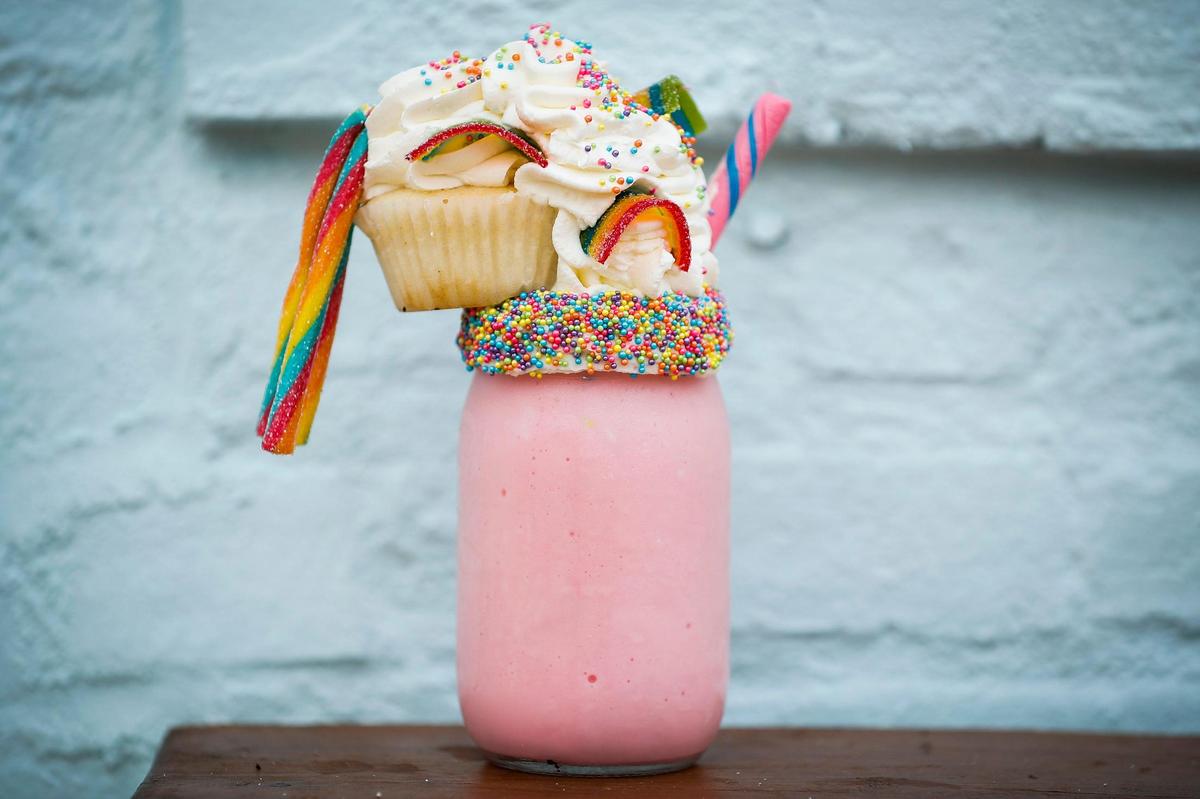 The Unicorn Cattywampus Milkshake is shown Aug. 15 at Sweet Matriarch Bakery in Georgetown. It is made with Blue Bell Pink Thing ice cream and topped with sprinkles, gummy straws and belts, whipped cream and a cupcake.