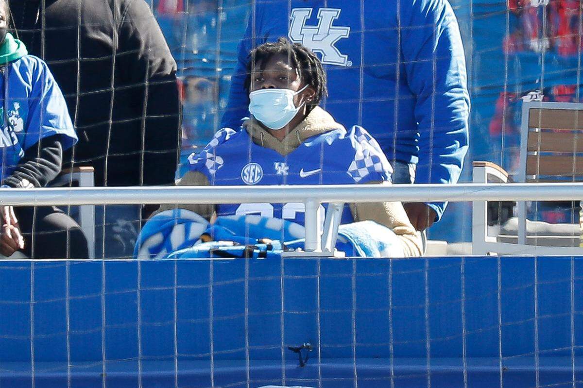 Kentucky linebacker Chris Oats (22) sits in the stands during UK’s 14-3 loss to Georgia last month.