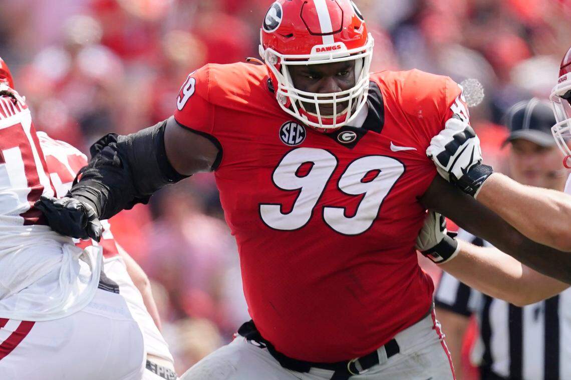 Georgia nose guard Jordan Davis (99) is the foundation of the Bulldogs’ top-in-the-nation defense.