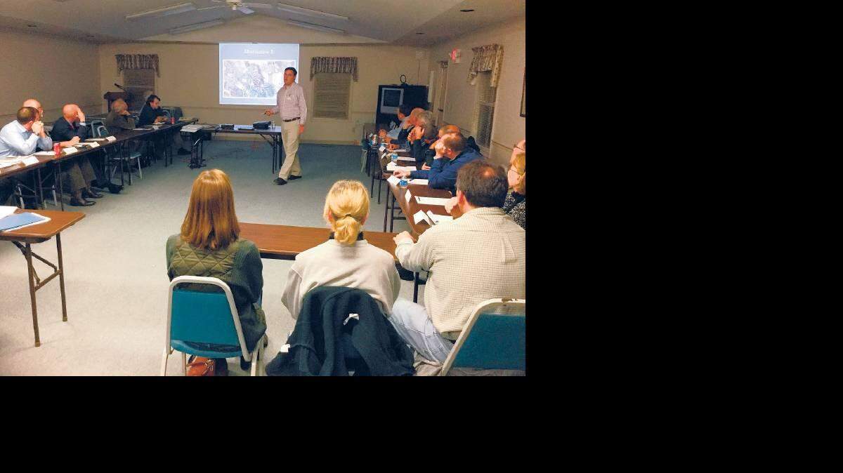 Arrell Thompson, a consultant for the Burgess & Niple engineering firm, spoke Thursday to members of the citizens advisory committee looking into a proposed bypass on the west side of Versailles.