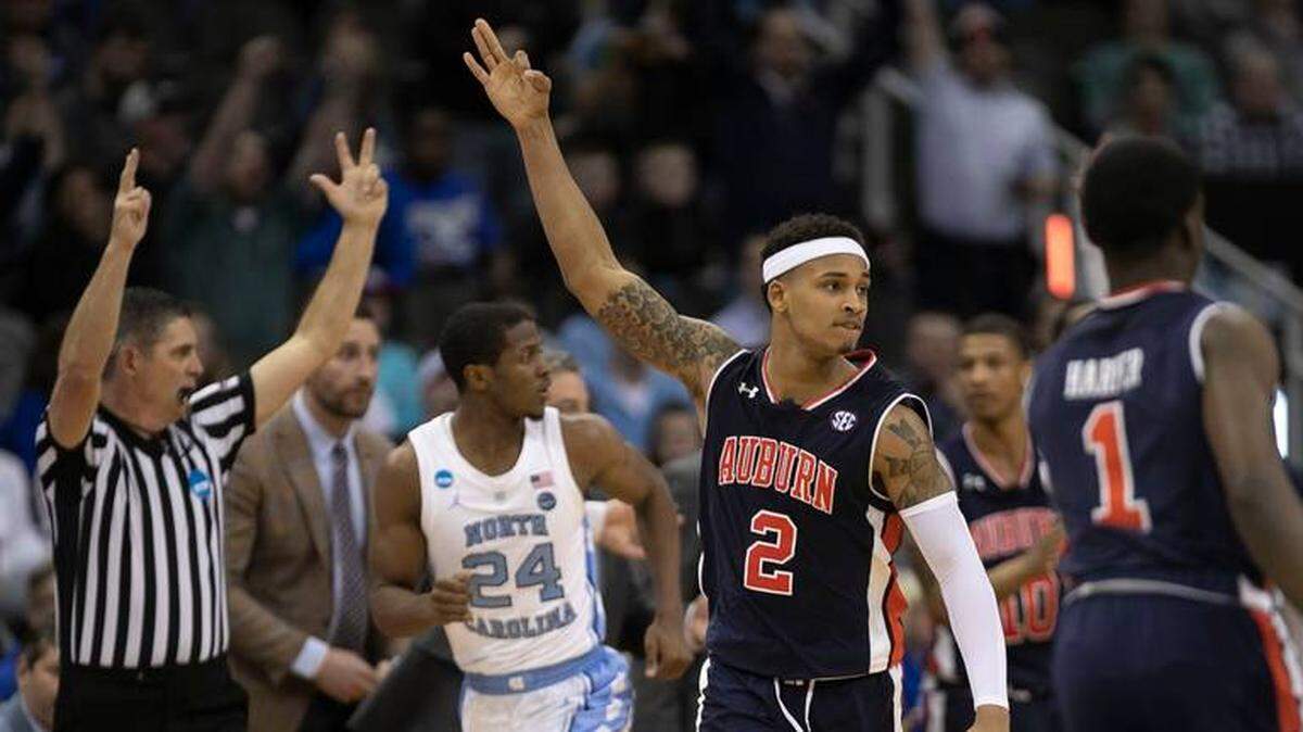 Auburn’s Bryce Brown (2) celebrates after a three-point basket during the second half against North Carolina during their NCAA Sweet 16 matchup on Friday, March 29, 2019 at the Sprint Center in Kansas City, Missouri. Auburn rolled to a 97-80 victory.