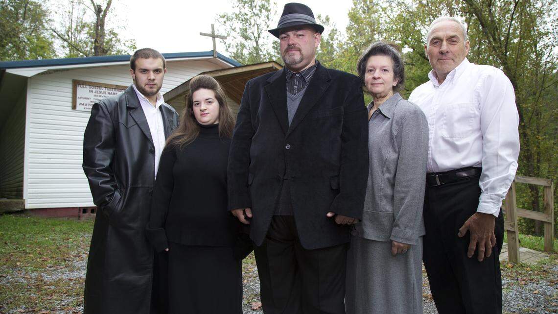 Jamie Coots, pastor of Full Gospel Tabernacle in Jesus Name, a snake-handling church in Middlesboro,  appeared with his family on the TV series Snake Salvation on National Geographic Channel. From left are son Cody; daughter Trina; Coots; wife Linda; and Coots' father, Greg Coots.   