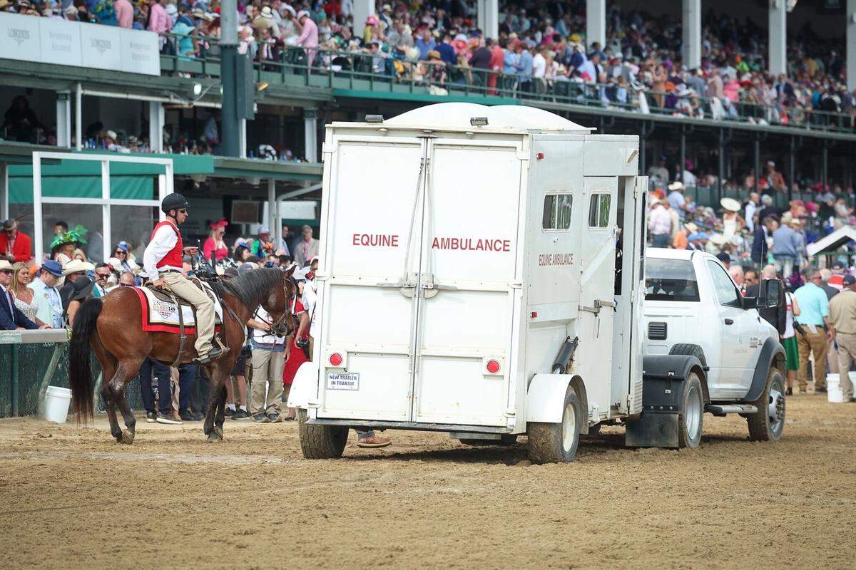 An equine ambulance enters the racetrack at Churchill Downs to collect one of the entrants in the 10th race, the Churchill Downs Stakes, on Derby Day in 2023.